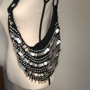 Hobo crochet purse with pearls /iridescent shells.